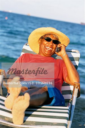 Woman at the Beach With Phone