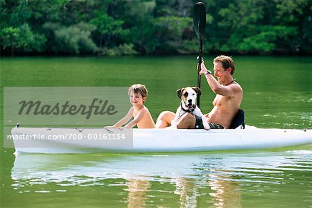 Father, Son and Dog in Kayak