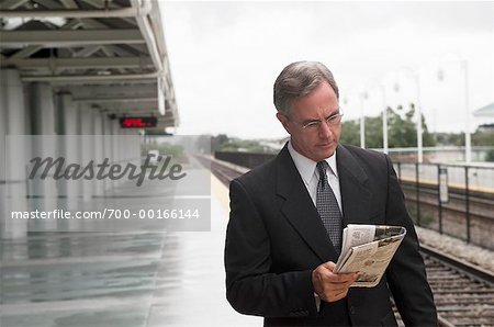 Businessman Waiting for Train