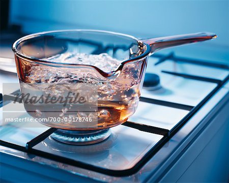 Water Boiling in Amber Glass Pot - Stock Image - C036/3727 - Science Photo  Library