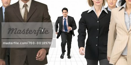 Businessman Running Towards Group of Business People