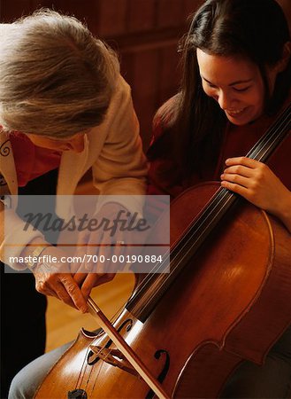 Teacher Instructing Student Cellist