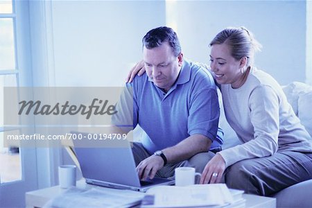 Couple Paying Bills Online