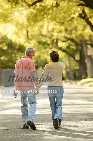 Couple Walking down Country Road
