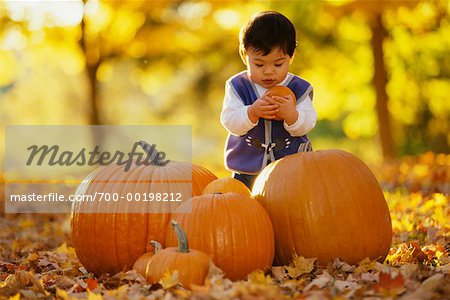 Child with Pumpkins