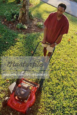 Man Mowing Lawn