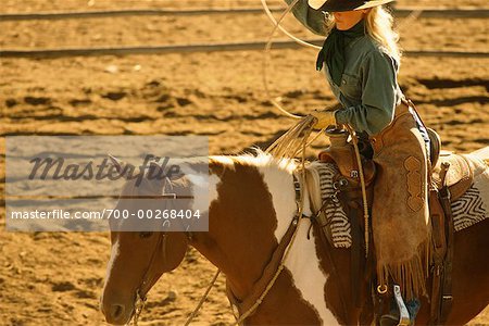 Cowgirl Throwing Lasso