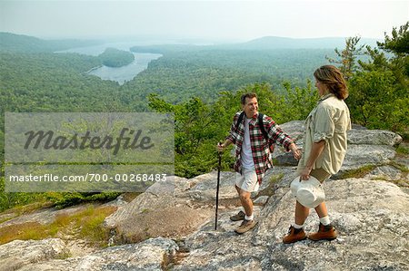 Couple Hiking on French's Mountain, Belgrade Lakes, Maine