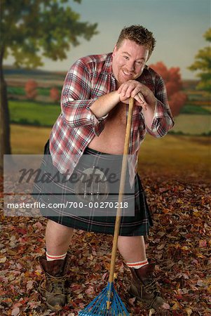 Man with a clearance rake