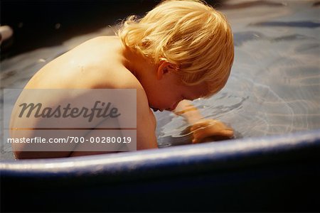 Child Playing in Pool