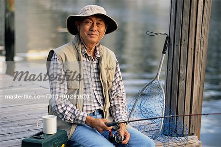 Man Fishing from Dock - Stock Photo - Masterfile - Rights-Managed, Artist:  George Shelley, Code: 700-00281870