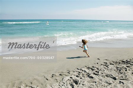 Girl Running on Beach