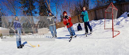 Family on Homemade Hockey Rink