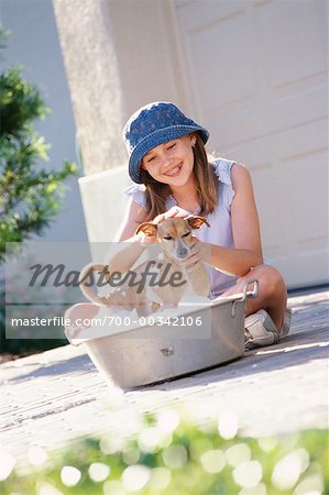 Girl Washing Dog