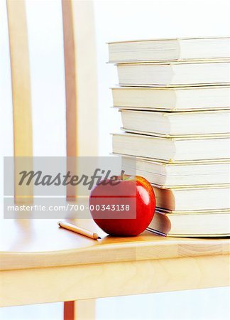 Apple, Pencil and Stack of Books