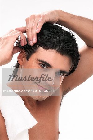 Man Brushing Hair