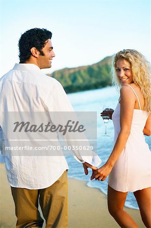 Couple Walking on Beach