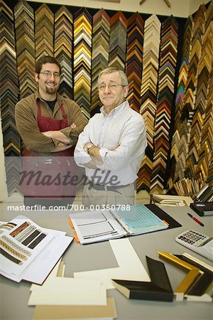 Portrait of a Father and Son in a Framing Shop