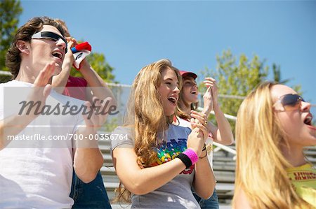 Teenage Spectators Sitting in Stands