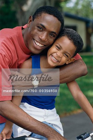 Portrait of Father and Son with Bike