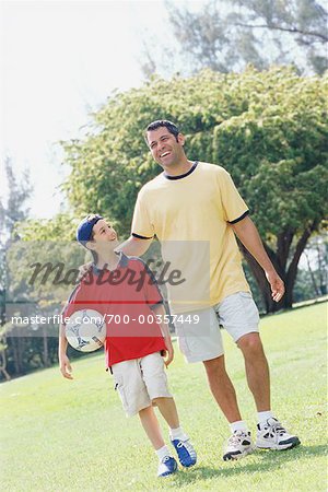 Father and Son with Soccer Ball