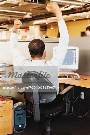 Businessman Cheering in Office