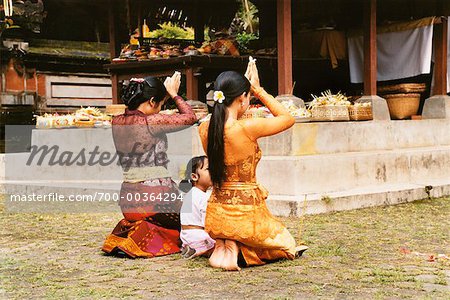 Women and Girl Praying at Temple Penestanan, Bali, Indonesia