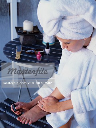 Woman Applying Nail Polish