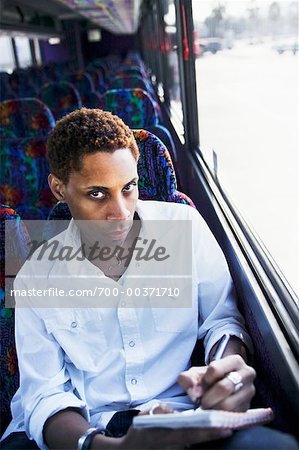 Man Sitting on a Train