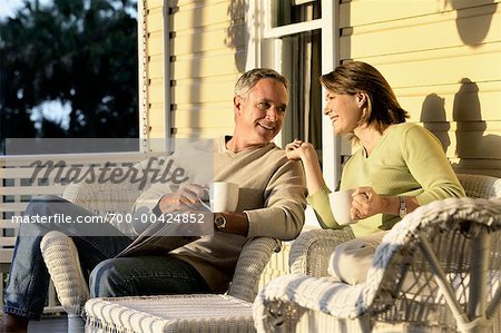 Couple Talking on Porch