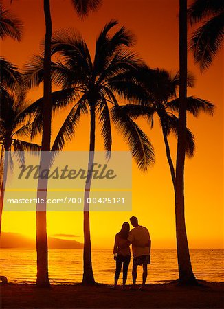 Couple Standing on Beach Oahu, Hawaii USA