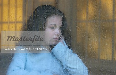 Girl Sitting at Window