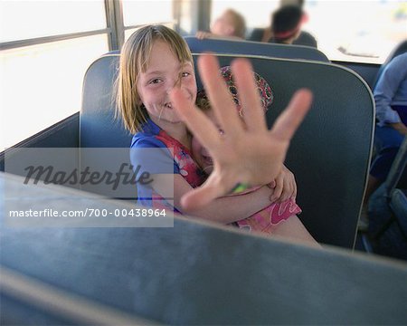 Girls Sitting on School Bus