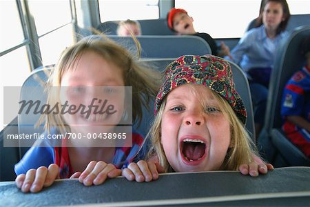 Girls Goofing Around on School Bus
