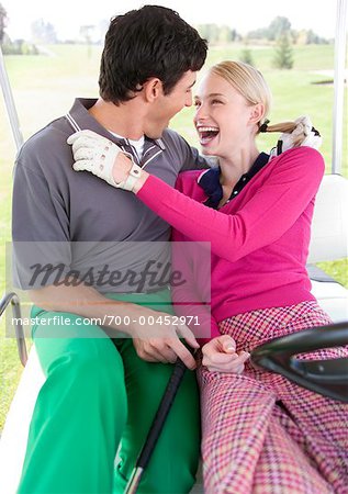 Couple in Golf Cart