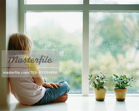 Girl Looking Out Window