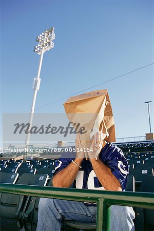 Photo: A New York Jets fan stands with a paper bag on his head -  NYP20161023125 