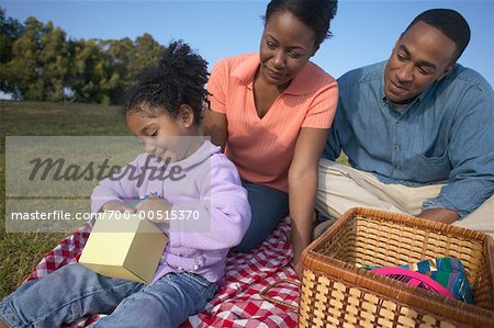 Mother, Father and Daughter Outdoors