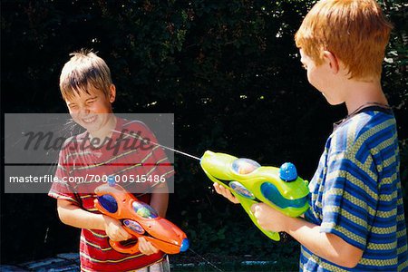 Boys Having Water Fight