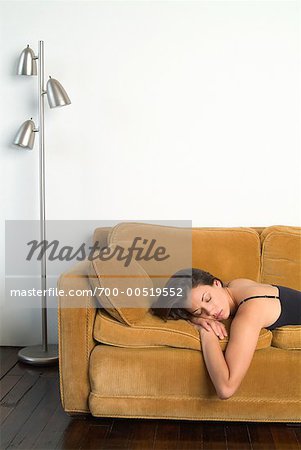Woman Sleeping on Sofa