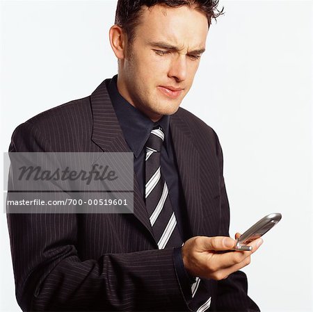 Businessman Using Cellular Phone