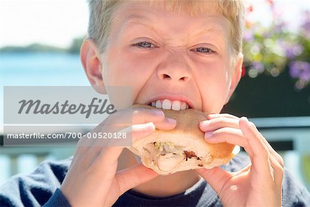 Boy Eating Sandwich