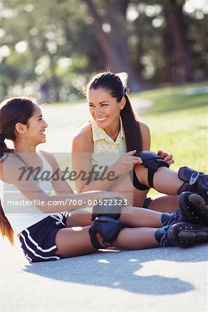 Mother and Daughter Rollerblading