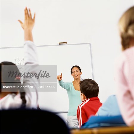 Teacher Calling on Student in Classroom