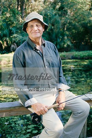 Man With Fishing Rod - Stock Photo - Masterfile - Rights-Managed, Artist:  Kevin Radford, Code: 700-00523508