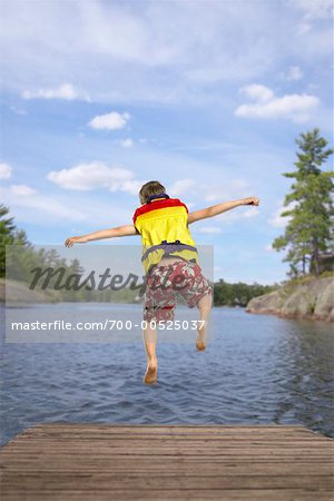Child Jumping into Lake