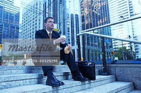 Businessman Eating Outdoors