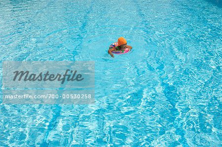 Girl Playing In Swimming Pool, Bangkok, Thailand