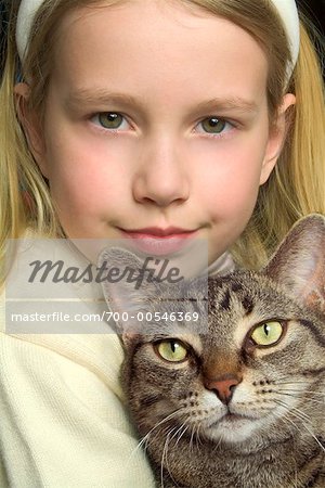 Portrait of Girl with Tabby Cat