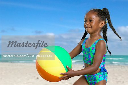 Girl on Beach with Beach Ball